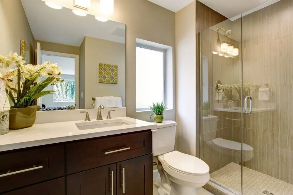 Incorporating Corner Sinks and Compact Toilets