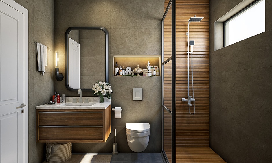 Smart Remodeling Solutions for Small Bathrooms 11 Contemporary small bathroom featuring a wood vanity, wall-mounted toilet, glass-enclosed shower, and built-in shelf with lighting