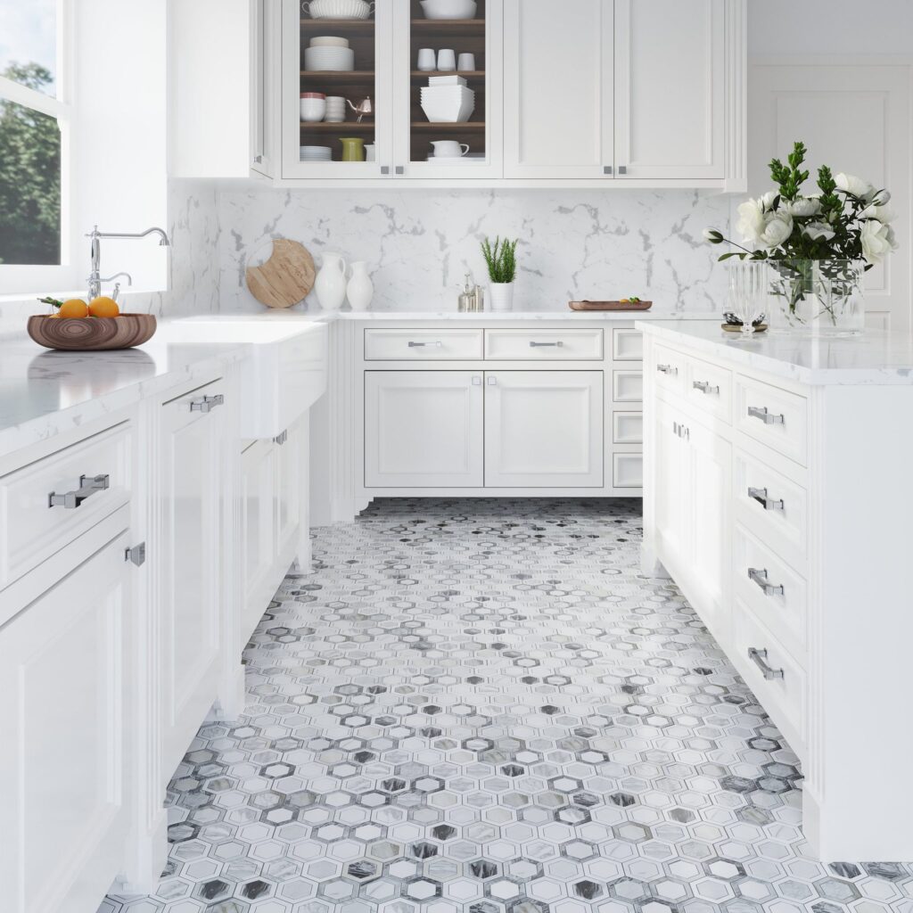 Creative Kitchen Floor Ideas 15 Bright white kitchen with marble countertops, hexagon-pattern marble tile flooring, and classic cabinetry.