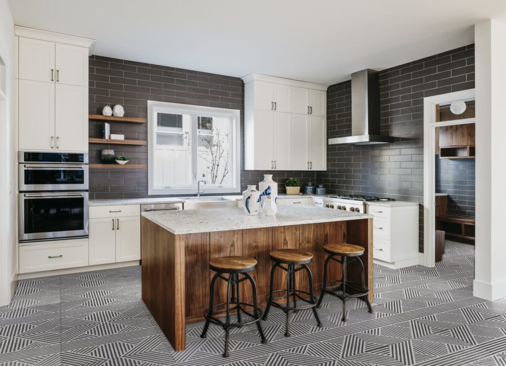 The Ultimate Guide to Kitchen and Floor Tiles 15 Nolita 24x24 inch matte porcelain floor tile with a soft concrete-like texture in a modern interior setting