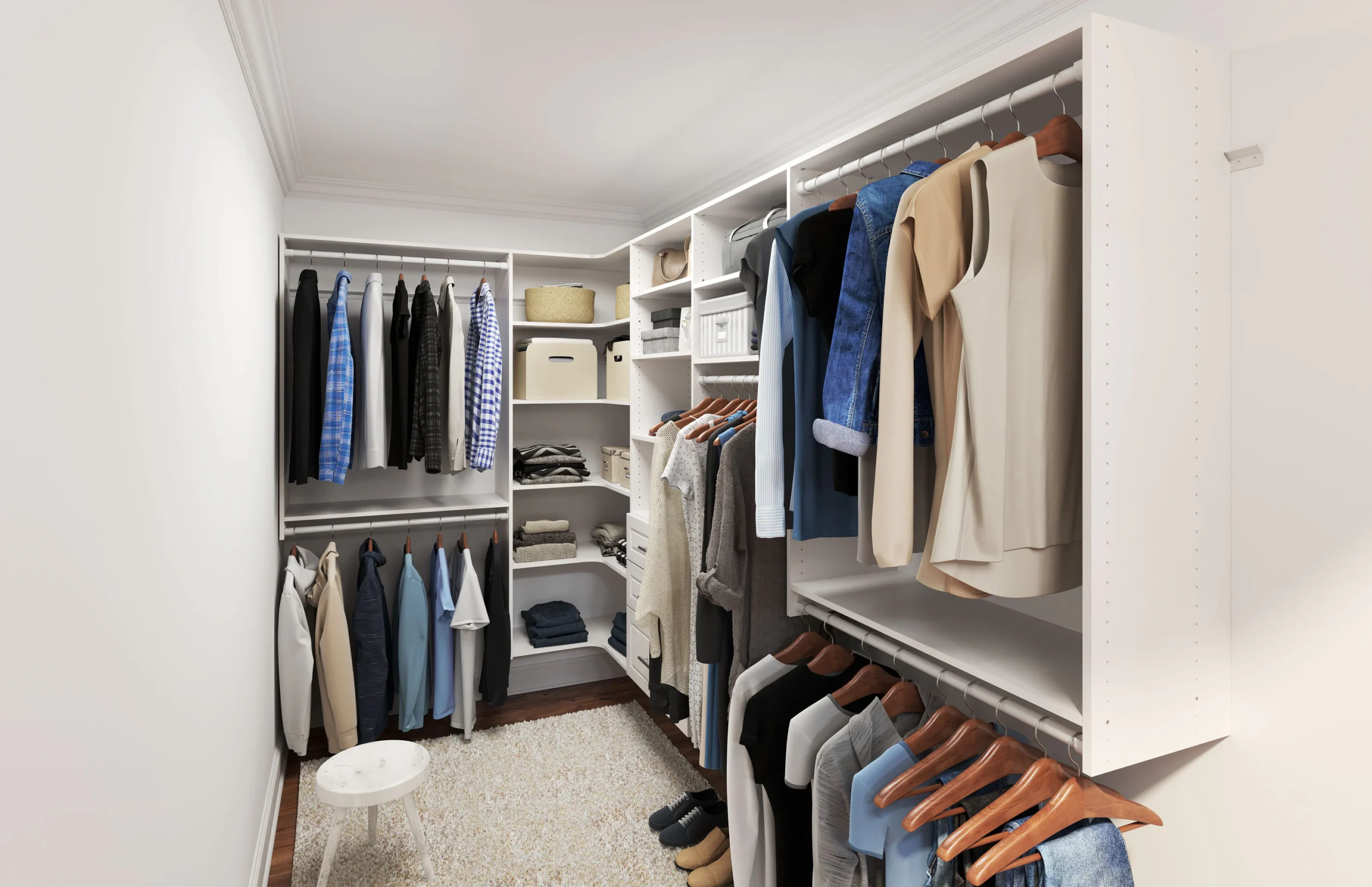 Organized walk-in closet featuring custom white shelving, hanging rods, and folded clothes.