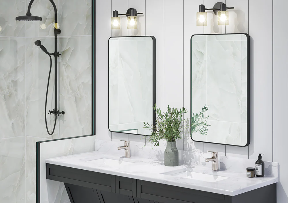Stylish bathroom with a double sink vanity, black-framed mirrors, marble countertop, and matte black shower fixtures