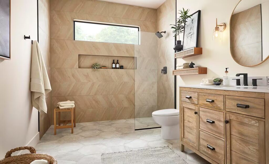 Elegant bathroom featuring a freestanding tub, dual vanity with marble countertops, and large windows.