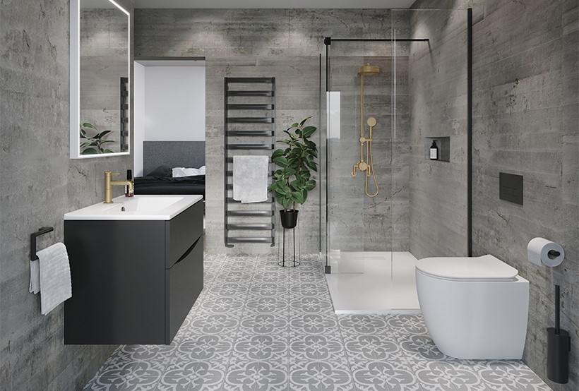 Modern industrial bathroom featuring concrete walls, patterned tile flooring, and a glass shower with gold fixtures.