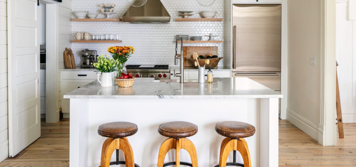 Farmhouse kitchen with timber cabinetry lighting in Arlington