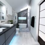 Modern bathroom with freestanding tub, stone accent wall, and sleek gray vanity.